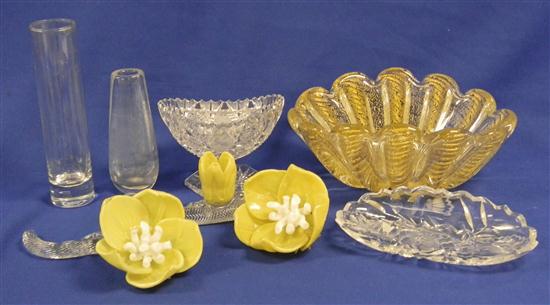 Two yellow glass flowers on