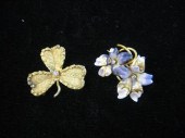 Two yellow gold and enamel pan
