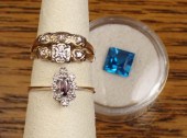 TWO YELLOW GOLD RINGS AND AN U