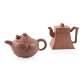 TWO YIXING STONEWARE TEAPOTS
2