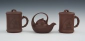 Two Yixing Tea Cups Made For S