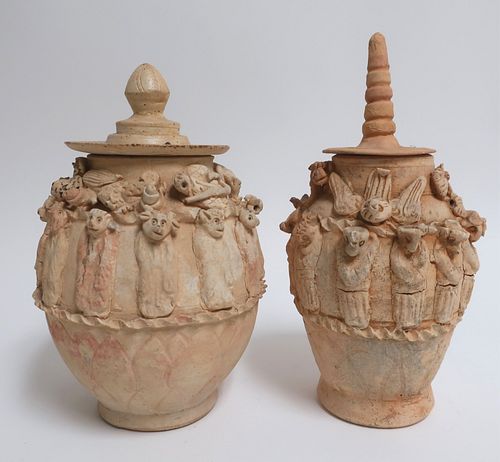 TWO ZODIAC FUNERARY JARUnglazed