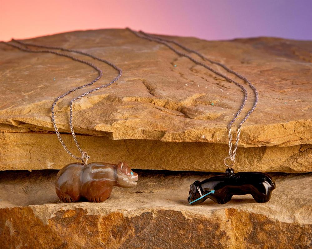 TWO ZUNI CARVED STONE FETISH