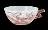 UNUSUAL CHINESE IRON-RED DRAGO
