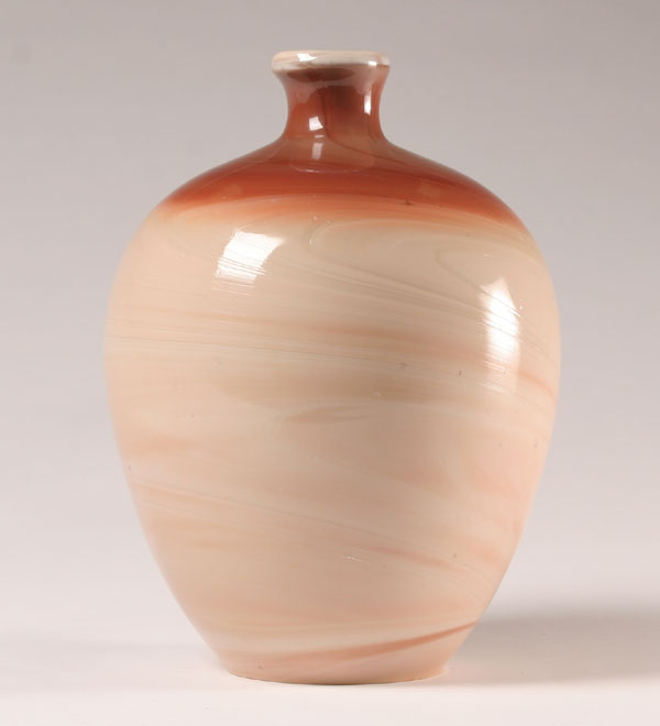 Unusual chocolate slag glass jug.