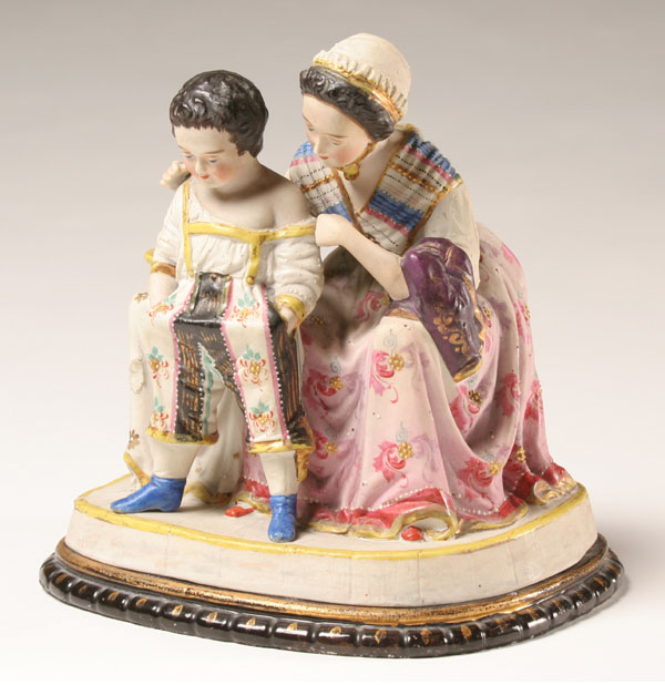 Unusual figural biscuit fired