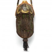 UNUSUAL PURSE WITH CARVED BAKE