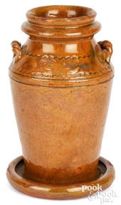 UNUSUAL REDWARE FOOTED VASE<br