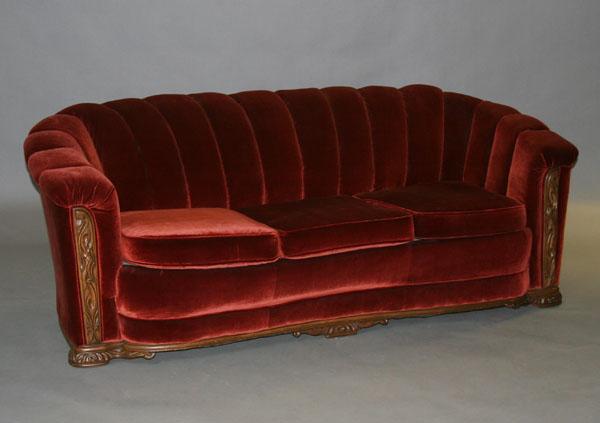 Upholstered Deco sofa; tufted