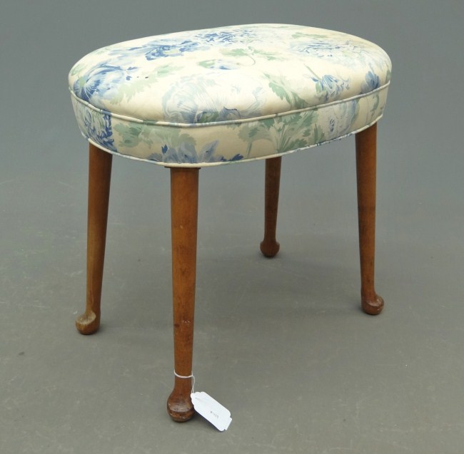 Upholstered footstool. 20'' W