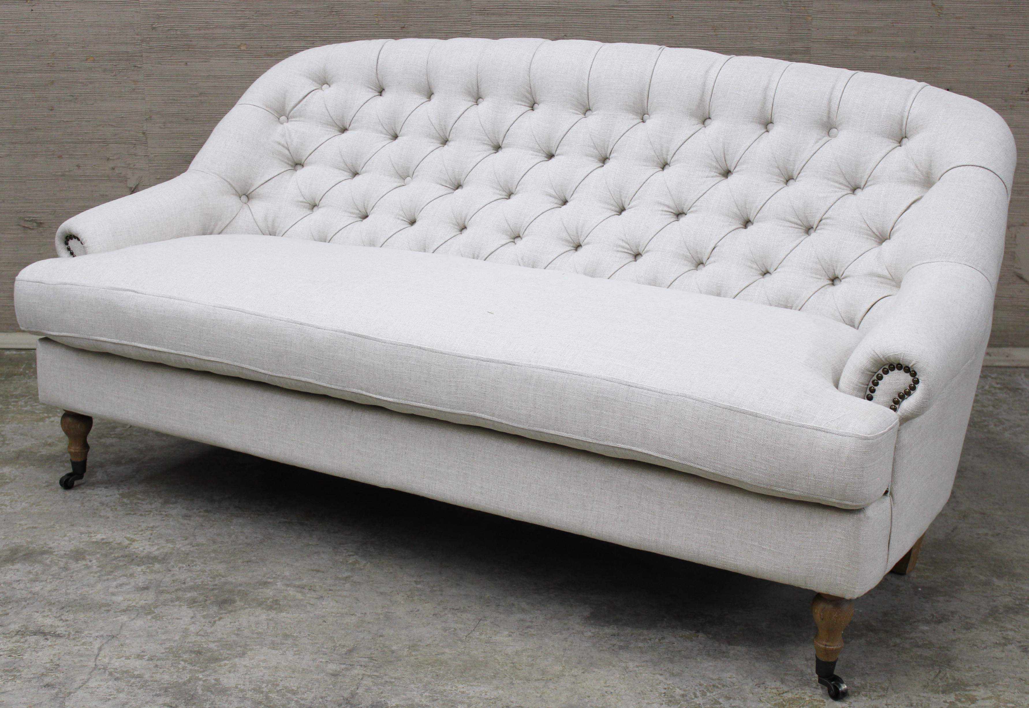 UPHOLSTERED SCROLL ARM SOFA