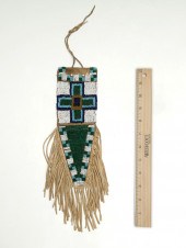 UTE BEADED HIDE TAIL BAG: Colo