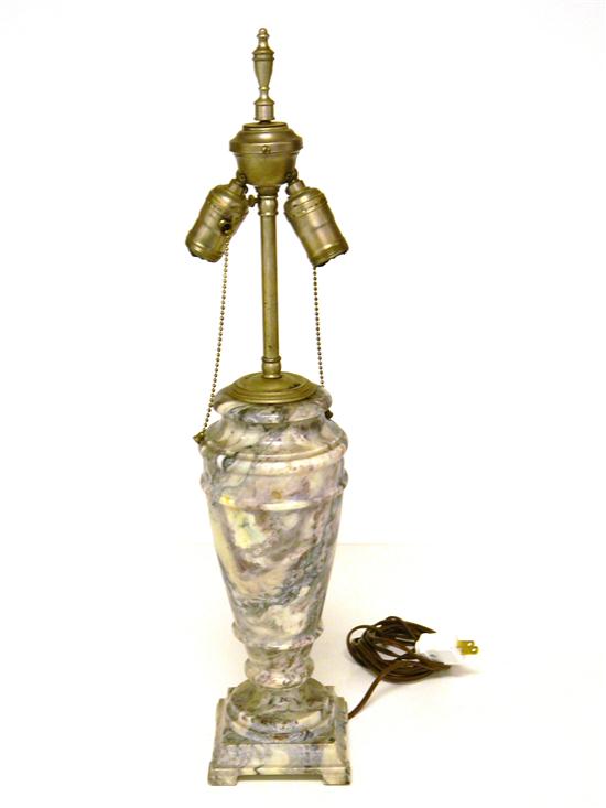 Variegated marble urn form table