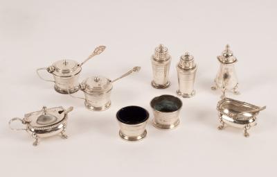 Various silver cruets comprising