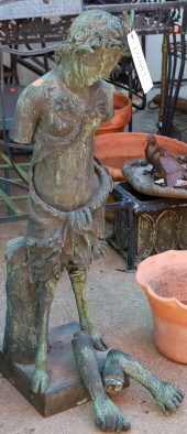 Verdigris metal statue of a fa