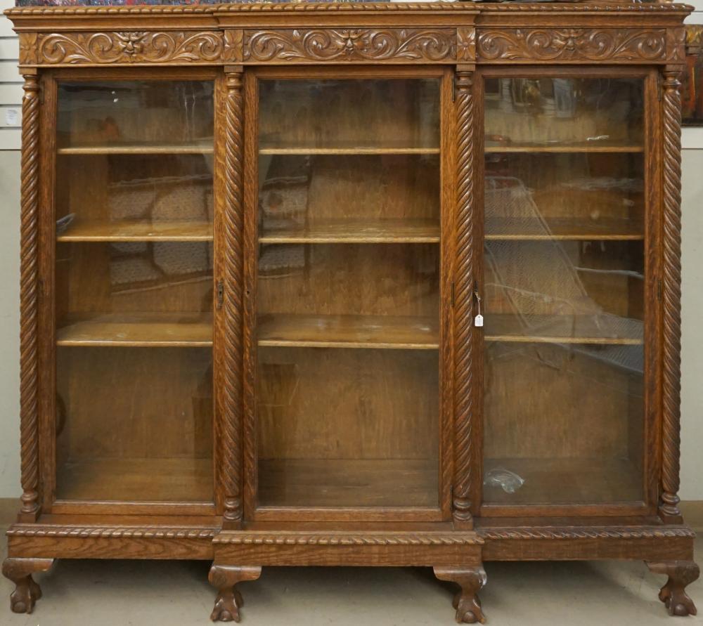 VICTORIAN CARVED OAK BOOKCASE, 66
