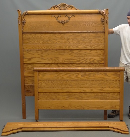 Victorian oak bed with rails.