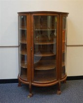 VICTORIAN OAK BOW-FRONT CHINA