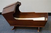 VICTORIAN WALNUT HOODED CRADLE