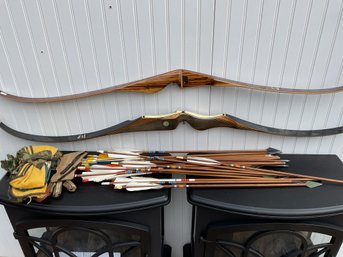 Vintage bows and arrows: two Bear