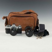 VINTAGE CANON AE-1 SLR IN BAG,