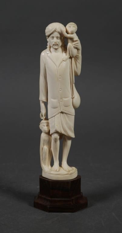 VINTAGE CARVED IVORY MAN &
