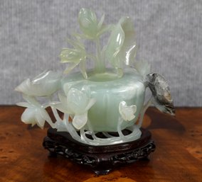 Vintage carved jade vessel in lotus