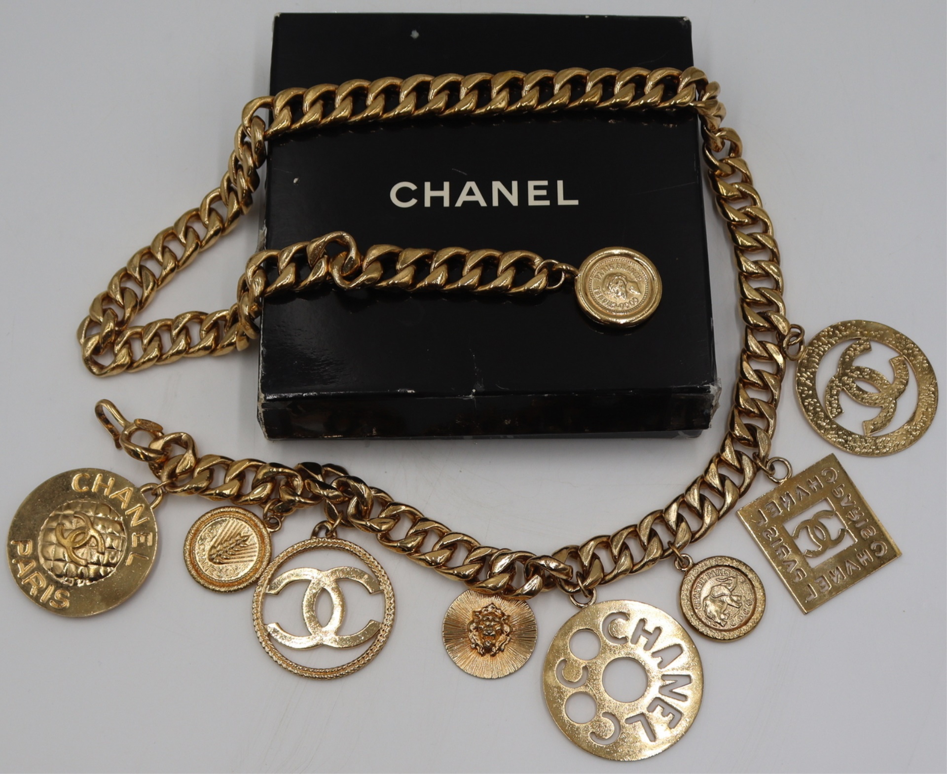 VINTAGE CHANEL LOGO MEDALLION BELT.