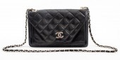VINTAGE CHANEL QUILTED BLACK L