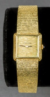 VINTAGE CORUM 18K YELLOW GOLD