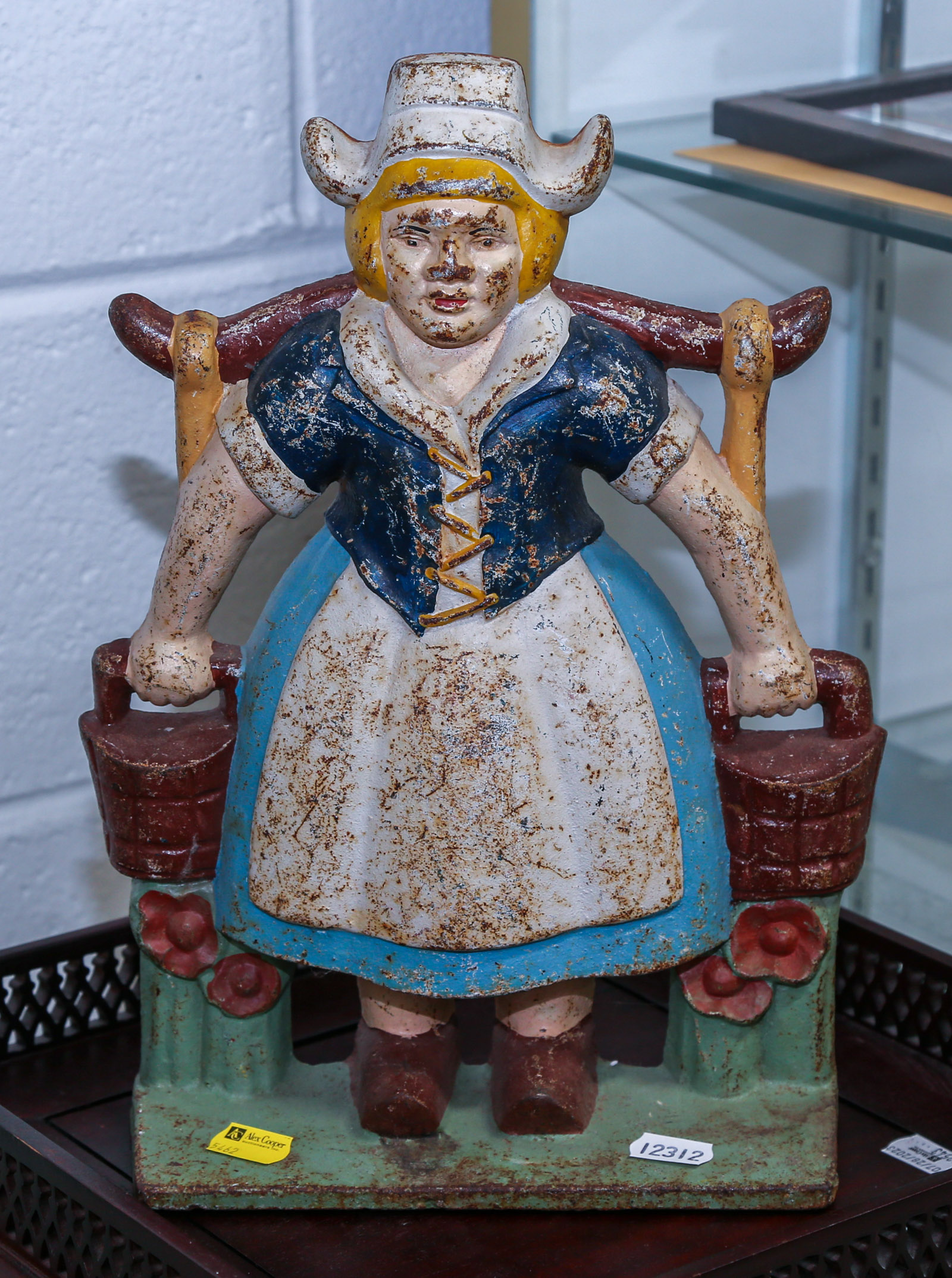 VINTAGE DUTCH WOMAN CAST IRON