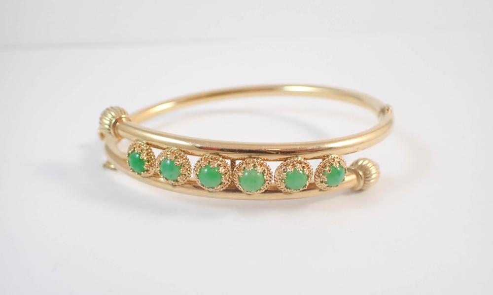 VINTAGE FOURTEEN KARAT GOLD BANGLE,