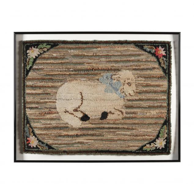 VINTAGE FRAMED HOOKED RUG OF A LAMB