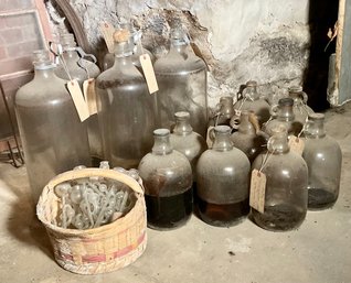 Vintage glass jugs once used for