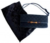 VINTAGE GUCCI CLUTCH IN MONOGR