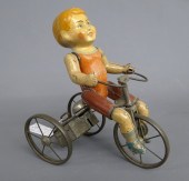 Vintage Kiddy Cyclist toy. 9 1