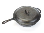 VINTAGE LODGE CAST IRON COVERE