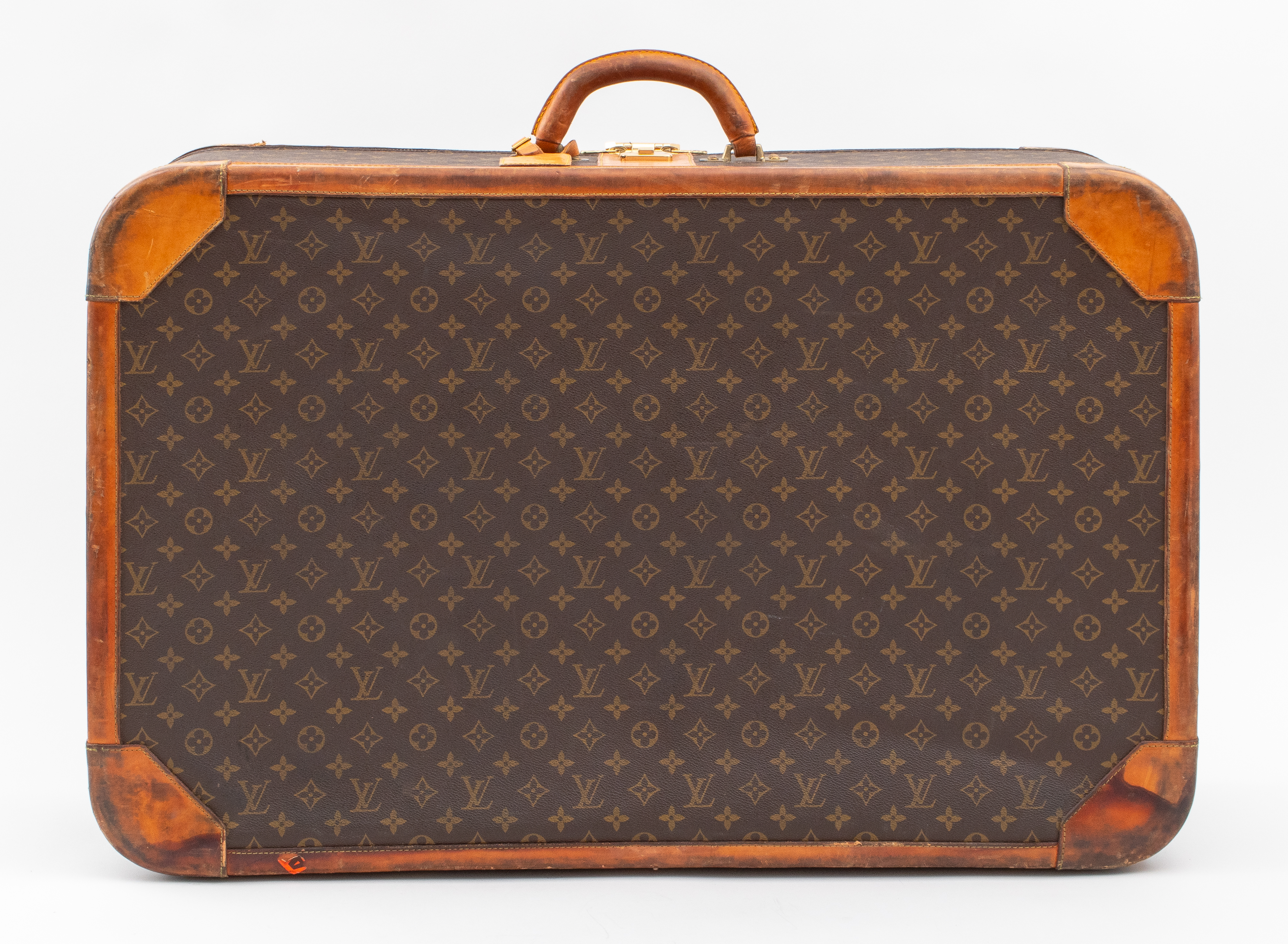 VINTAGE LOUIS VUITTON LEATHER BOUND