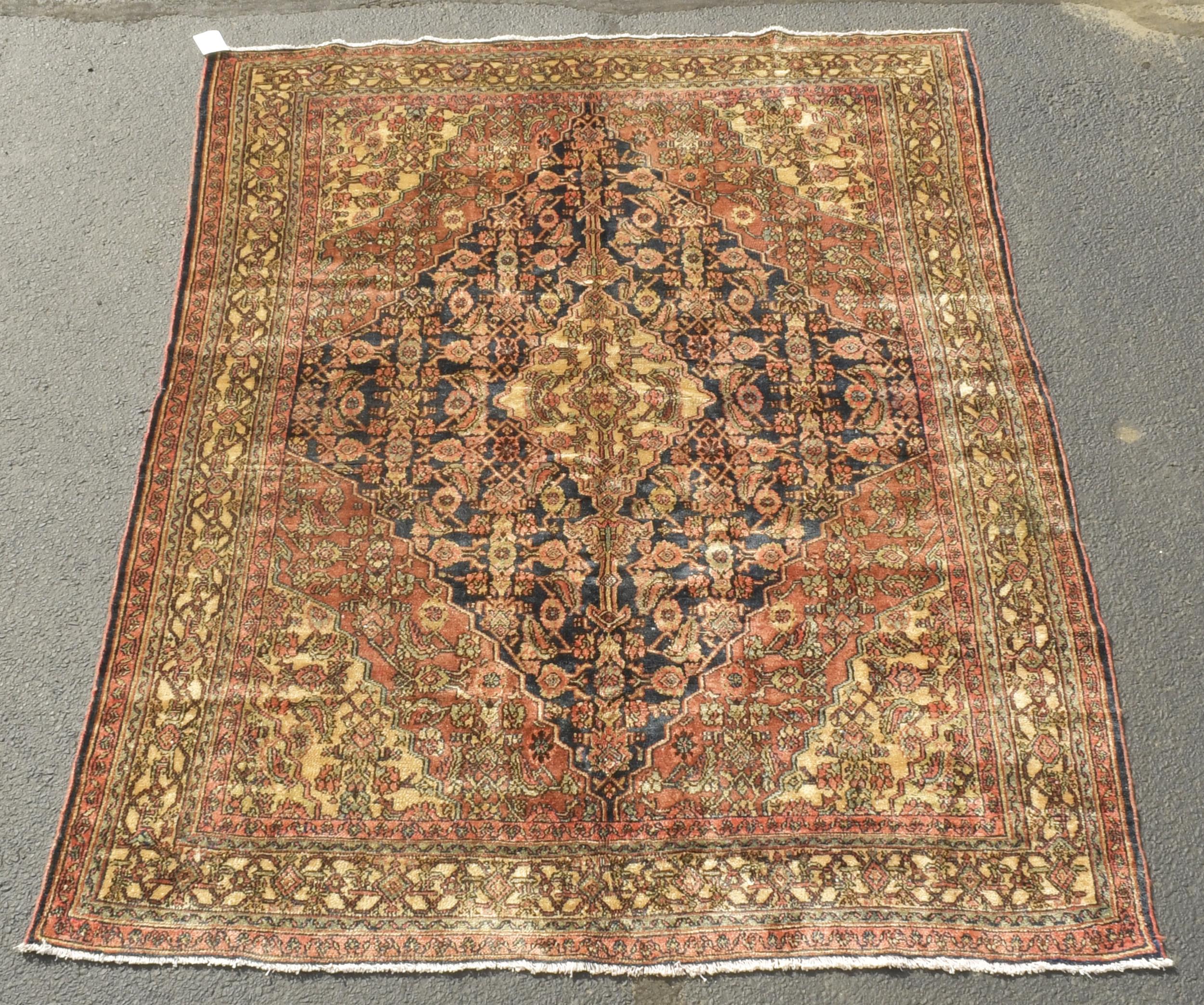 VINTAGE ORIENTAL AREA RUG. A