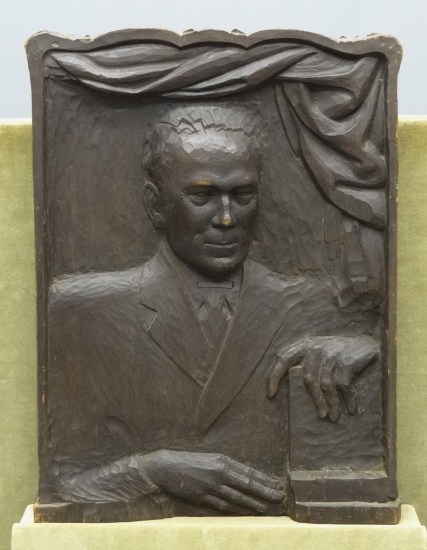 Vintage relief carved plaque of