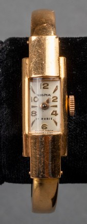 VINTAGE SIGMA 18K YELLOW GOLD