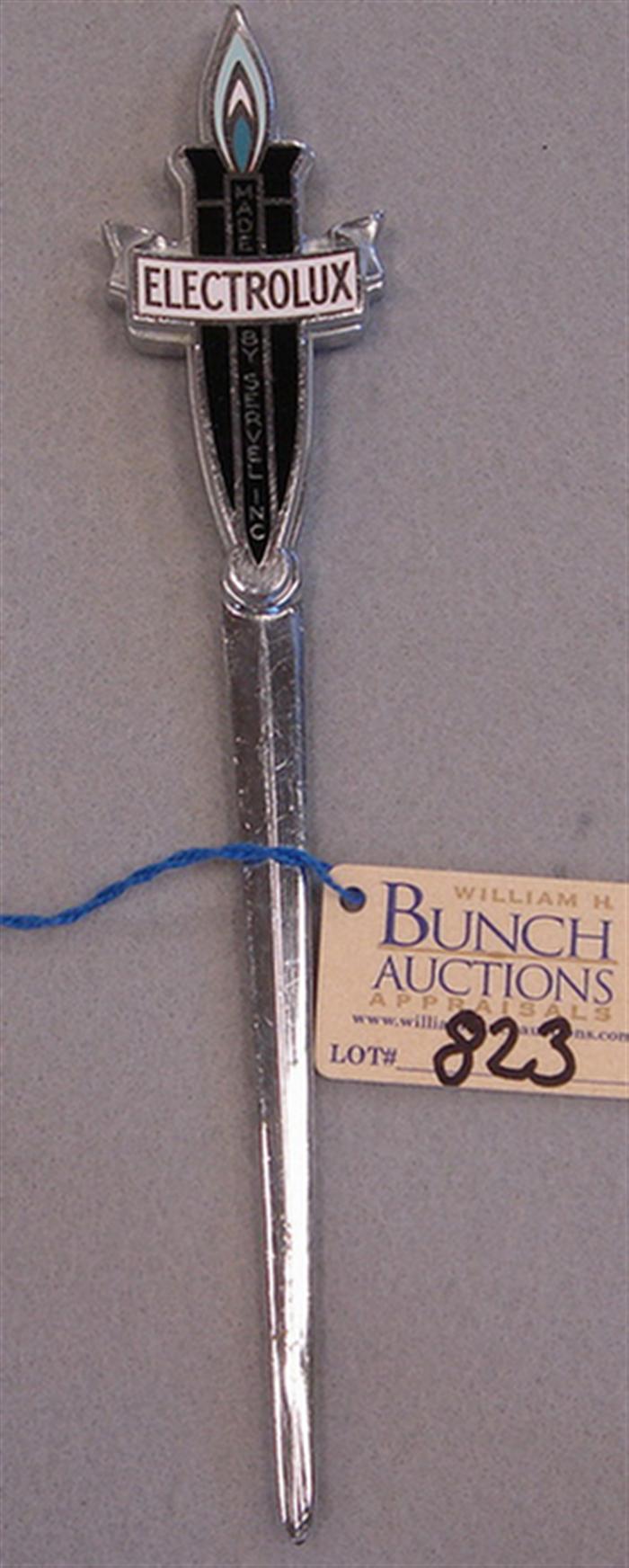 Vintage white metal letter opener.