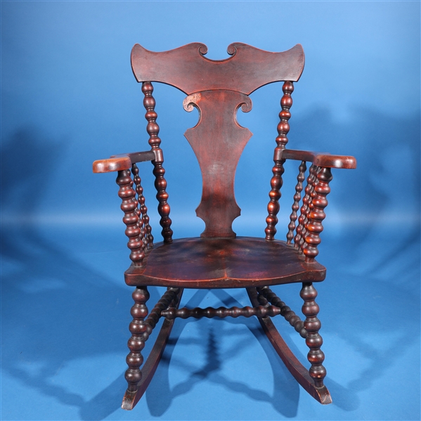 Vintage wooden rocking chair, early