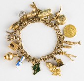 VINTAGE YELLOW GOLD CHARM BRAC