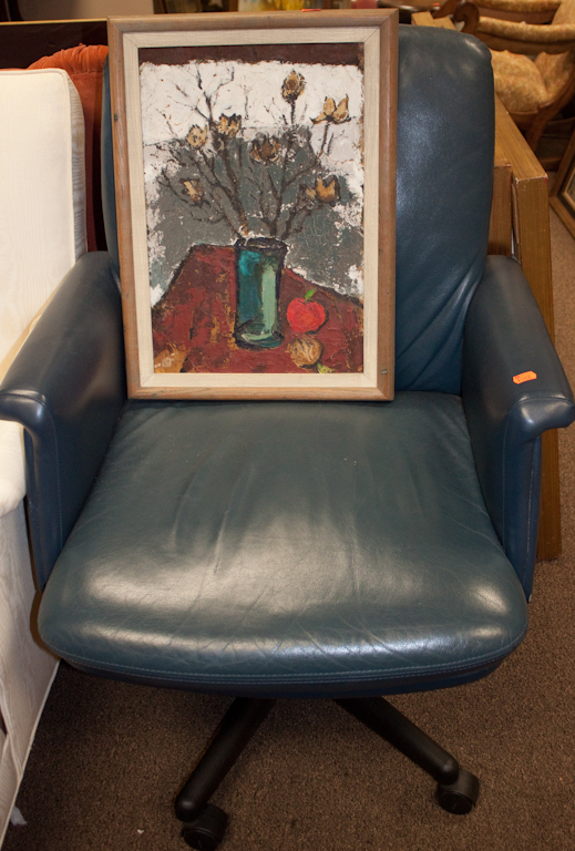 Vinyl upholstered swivel armchair