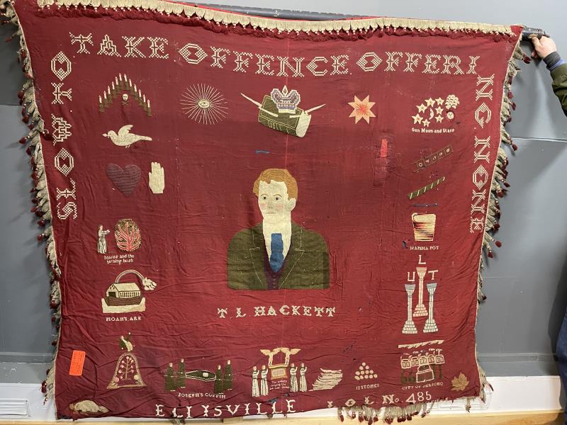 WALL HANGING, THE PRIEST CARRYING