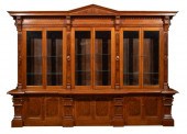 WALNUT BREAKFRONT BOOKCASE, AT