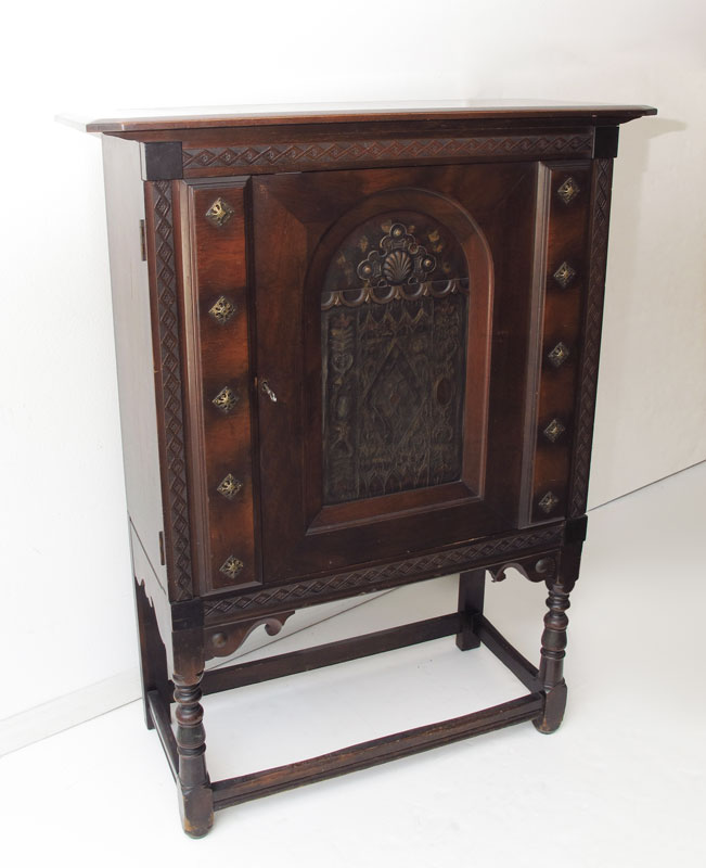WALNUT CABINET ON LEGS WITH HAND