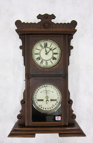 WALNUT CASED DOUBLE-DIAL CALENDAR