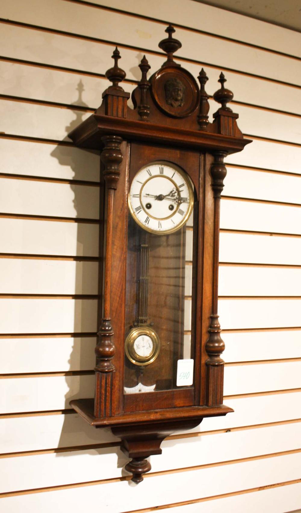 WALNUT CASED R&A WALL CLOCK,